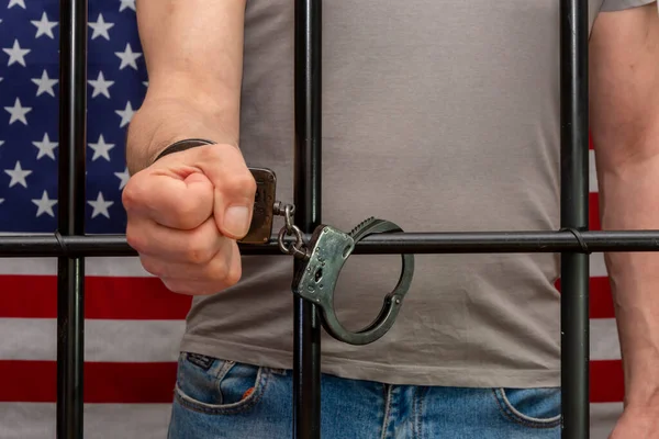 Man Handcuffed Cell Bars Background American Flag Concept Prisoner Courtroom — Stok fotoğraf