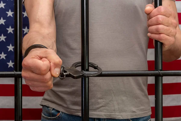 Man Handcuffed Cell Bars Background American Flag Concept Prisoner Courtroom — ストック写真