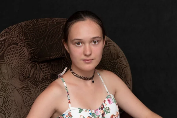 Teenage Girl Long Hair Sitting Chair Black Background — Foto de Stock