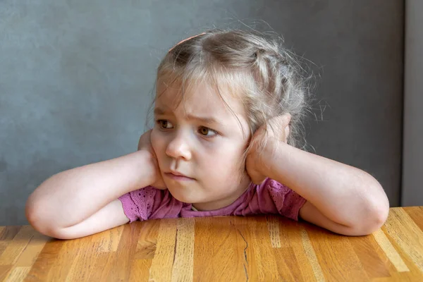 Beautiful Blonde Girl Years Old Thinking While Sitting Table — Fotografia de Stock