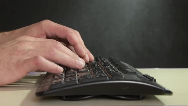 Man Typing Computer Keyboard Dark Background Close His Hands — Stock Video