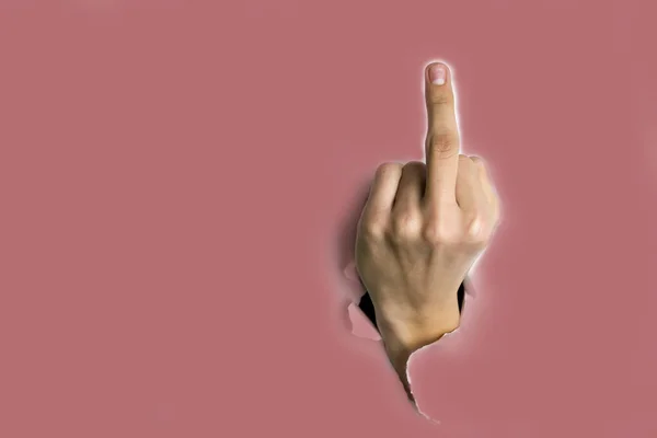 Finger hand symbolize middle finger sign concept in gesture meaning fuck you or go fuck you isolated on pink — Stock fotografie