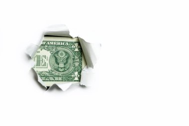 Dolar. Beyaz arka planda bir delikte bir dolar farklı parçalar görünüyor..