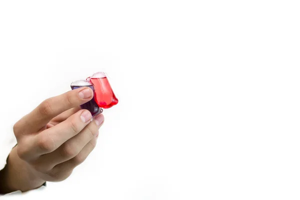 The hand holds a gel liquid powder on a white background. — Stock Photo, Image