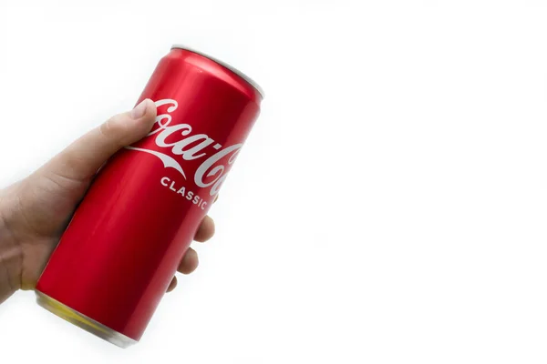 Coca Cola in the hands of a child on a white background.Kazakhstan SKO 03.03.2022 — Stock Photo, Image