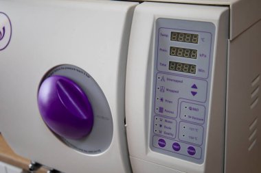 machine for sterilizing medical equipment in blue, medic light. High quality photo