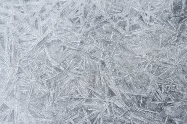 Kış mevsiminde yakın çekim ya da donmuş suyun buz kristallerinin makroyu