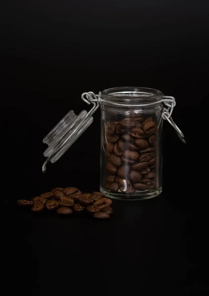 Studio Photo Brown Coffee Beans Glass Jar Black Background — Stok fotoğraf