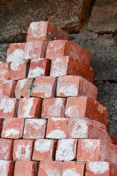 Red bricks lying on top of each other, concept of building
