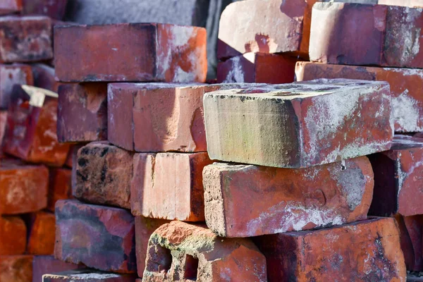 Red bricks lying on top of each other, concept of building