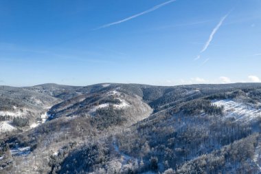 winter mountain landscape, beautiful sky in thuringian forest