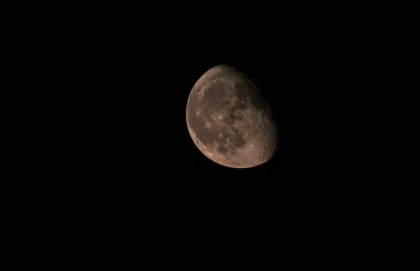 Close-up image of the moon in growth phase, crescent