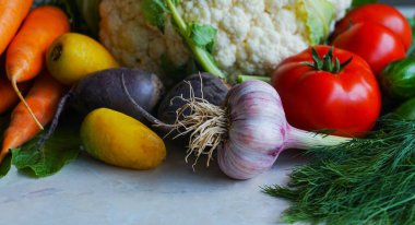                                Cauliflower and various vegetables are on the table    