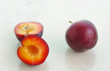                       semi-red plum on a white background         