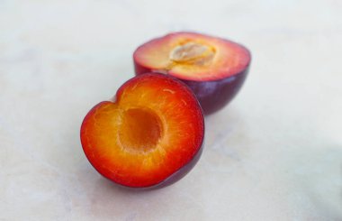                                semi-red plum on a white background