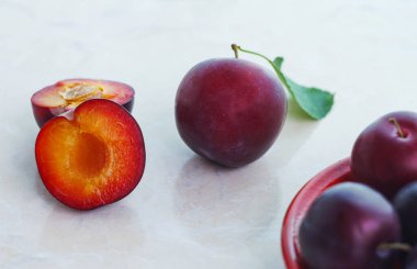                                semi-red plum on a white background    