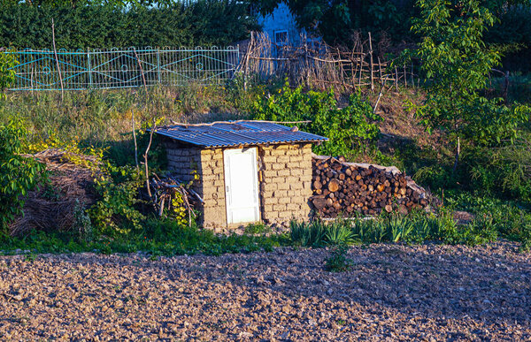 A small house was built in the middle of the field