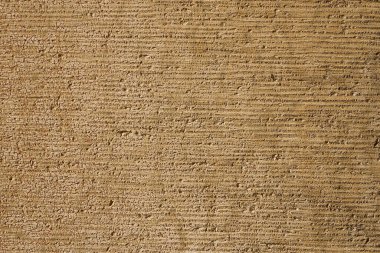 Antika bir beton duvar arka plan olarak açık kahverengidir.