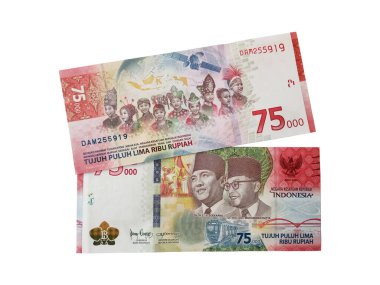 Two sheets folding money rear side on front side of Indonesian Rupiah Seventy five thousand money on isolated background