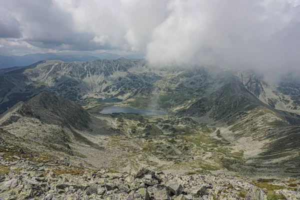 Lake on the background of mountains  Retezat Mountains