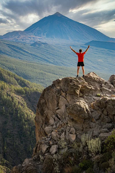 man hiking in El Teide national park Tenerife. hiking in the mountains
