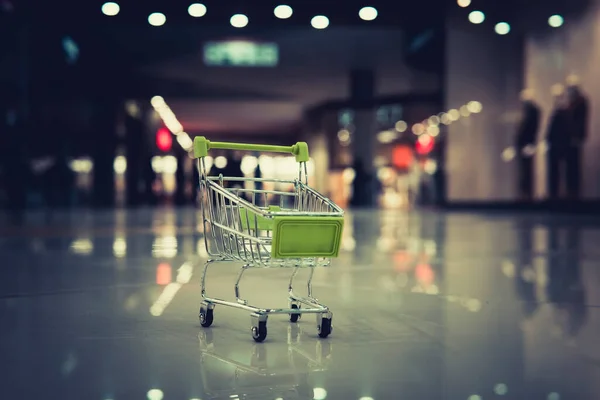 Conceptual Shot Small Shopping Cart Put Floor Blur Background Shopping — Foto Stock