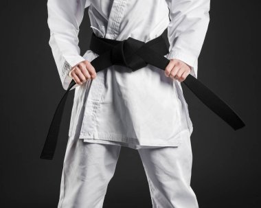 Kara kuşak sahibi karate dövüşçüsü. Yüksek kalite güzel fotoğraf konsepti