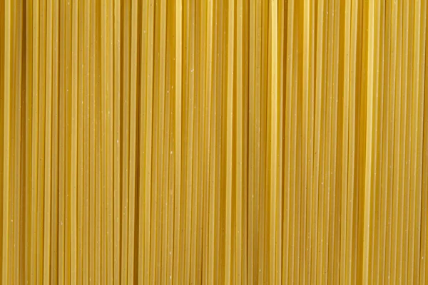 Rohe Spaghetti aus nächster Nähe. Hochwertiges schönes Foto-Konzept — Stockfoto