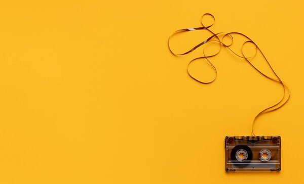 cassette tape yellow background. High quality photo