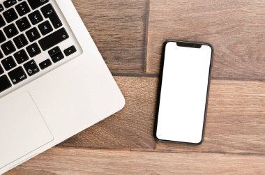 Üst görünüm akıllı telefon şablonu çalışma alanı. Yüksek kalite fotoğraf