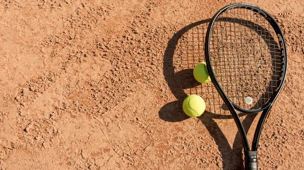 Tennis balls black racket. High quality photo — Stock Photo, Image