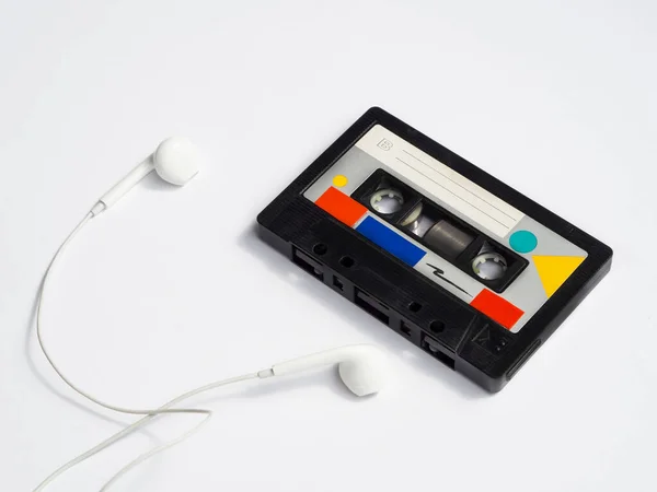 Colorful vintage cassette tape with headphones. High quality photo — Stock Photo, Image