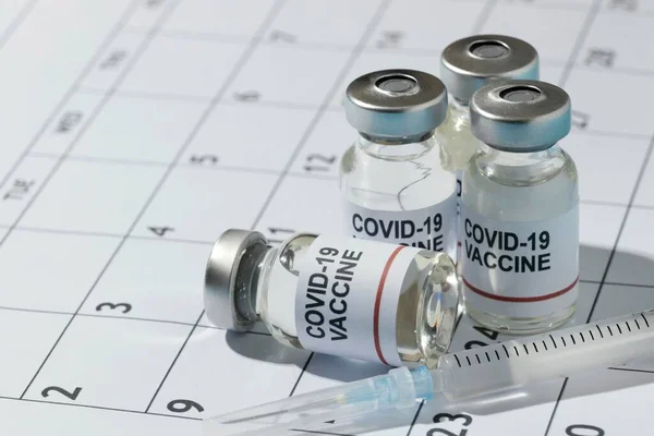 Calendario minimo di composizione dei flaconi di vaccino. Foto di alta qualità — Foto Stock