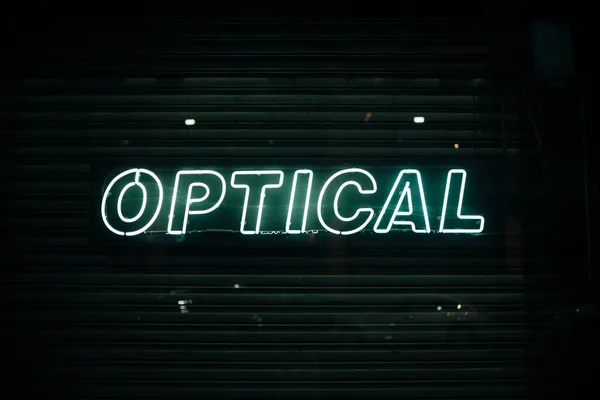 Optiska skyltar neonljus. Högkvalitativt foto — Stockfoto