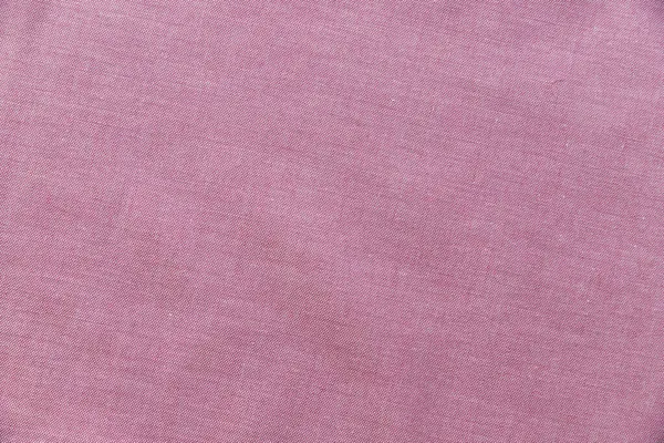 Verhoogd zicht roze textiel achtergrond. Hoge kwaliteit foto — Stockfoto