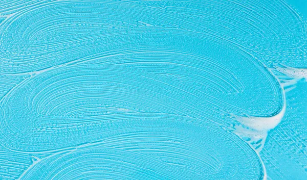Plano laico jabón espuma fondo azul. Foto de alta calidad — Foto de Stock