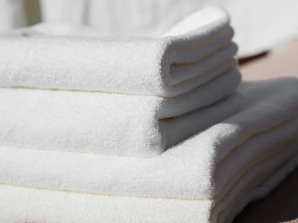 Close up white folded clean towels. High quality photo — Stock Photo, Image