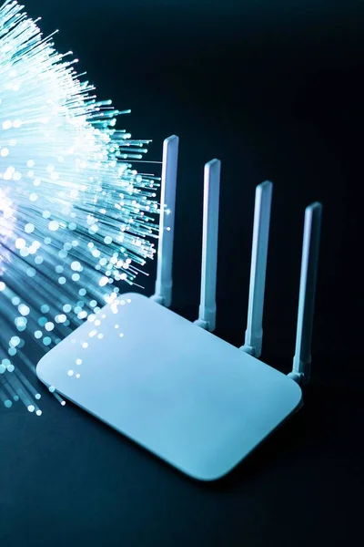 wi fi router with blue optical fiber. High resolution photo