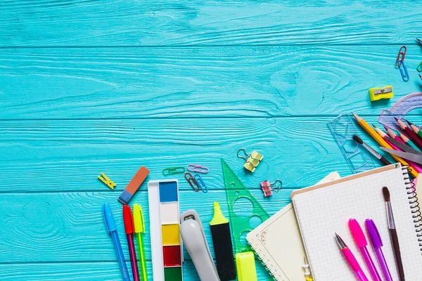 school materials colorful table