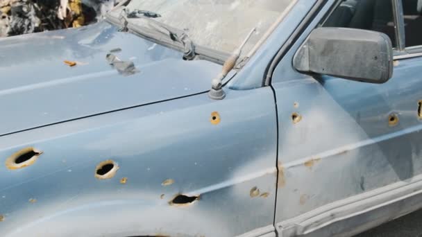 Irpin, a shot car after the war, the consequences of the invasion of Russian troops in Ukraine — Stock Video