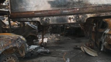 Irpen, Rusty shelled cars, the consequences of the Russian armys invasion of Ukraine. War in Ukraine. High quality 4k footage
