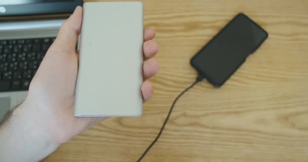 Connecting Usb Charging Cable Powerbank Smartphone Starts Charging Close Mans — Stockvideo