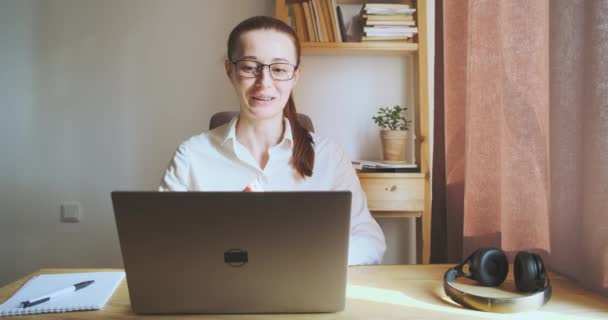 Young Woman Ends Her Video Call Says Goodbye Closes Laptop — Stockvideo