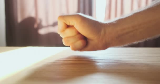 Mans Fist Hits Table Side View Close Sunlight Window Concept — 图库视频影像