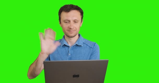 Young Man Holds Laptop Front Him Communicates Video Call Waving — Stock videók