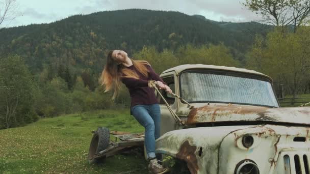 Long Haired Woman Swings Steps Old Abandoned Rusty Truck Middle — Stock videók