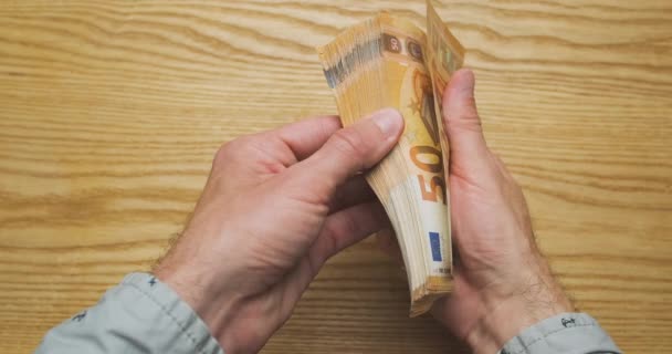 Male Hands Hold Stack Banknotes Euro Bills Flips Them Edge — 图库视频影像