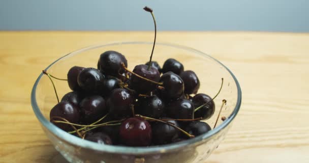 Hand Picks One Cherry Plate Close Glass Bowl Cherries Stands — Video Stock