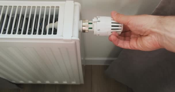 Hand Reduces Temperature House Thermostat Central Radiator Close Top View — Stockvideo