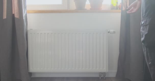 Unrecognizable Man Turns Thermostat Radiator Window Bright Sunlight Comes Window — Stockvideo